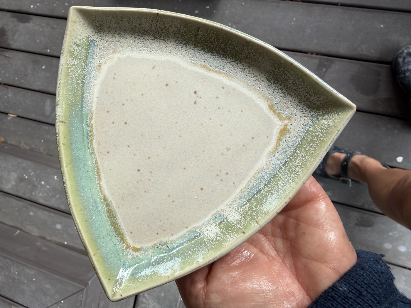 Triangular teal and cream speckled plate