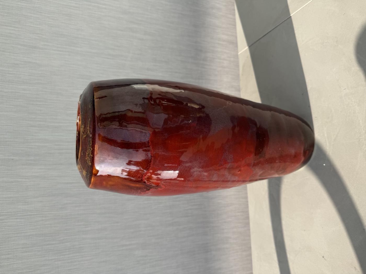 Deep crimson oxblood glaze vase